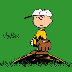Charlie Brown looking dismayed on the pitcher's mound